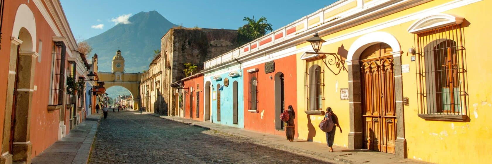 A street with colorful buildings in Guatemala.