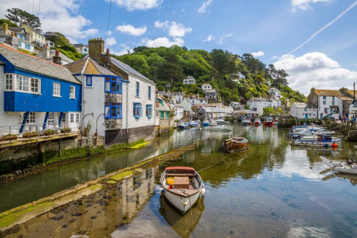 Boats moored in a harbour in Polperro in Cornwall.